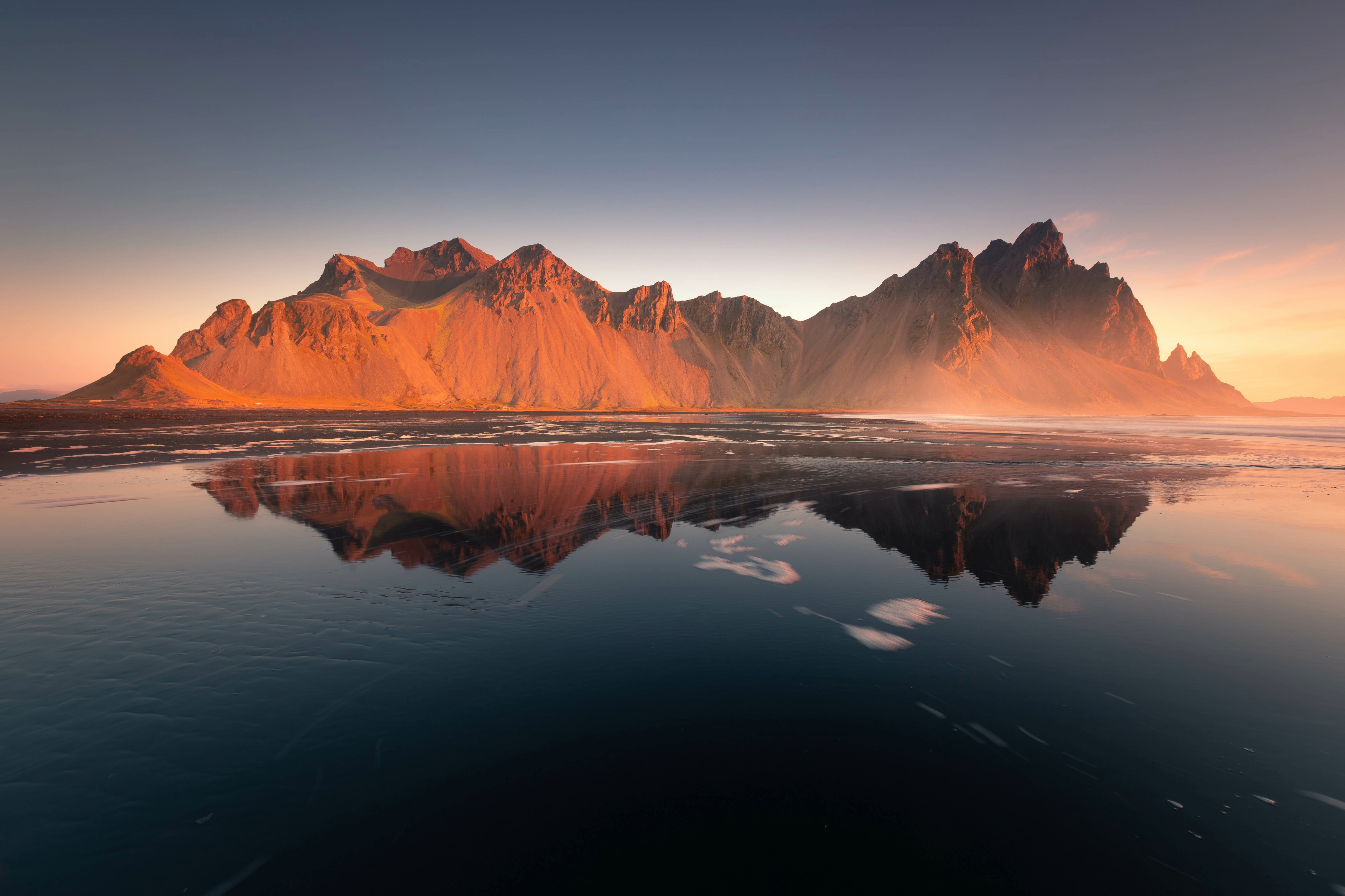 Orange Mountains Reflected in a Lake